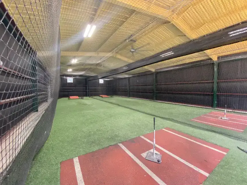Cage lanes with tees and clay batting boxes