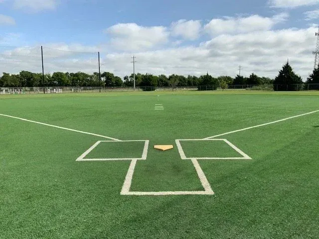 Outdoor regulation turf practice field seen from home plate